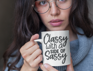 coffee-mug-mockup-featuring-a-woman-with-round-glasses-22435